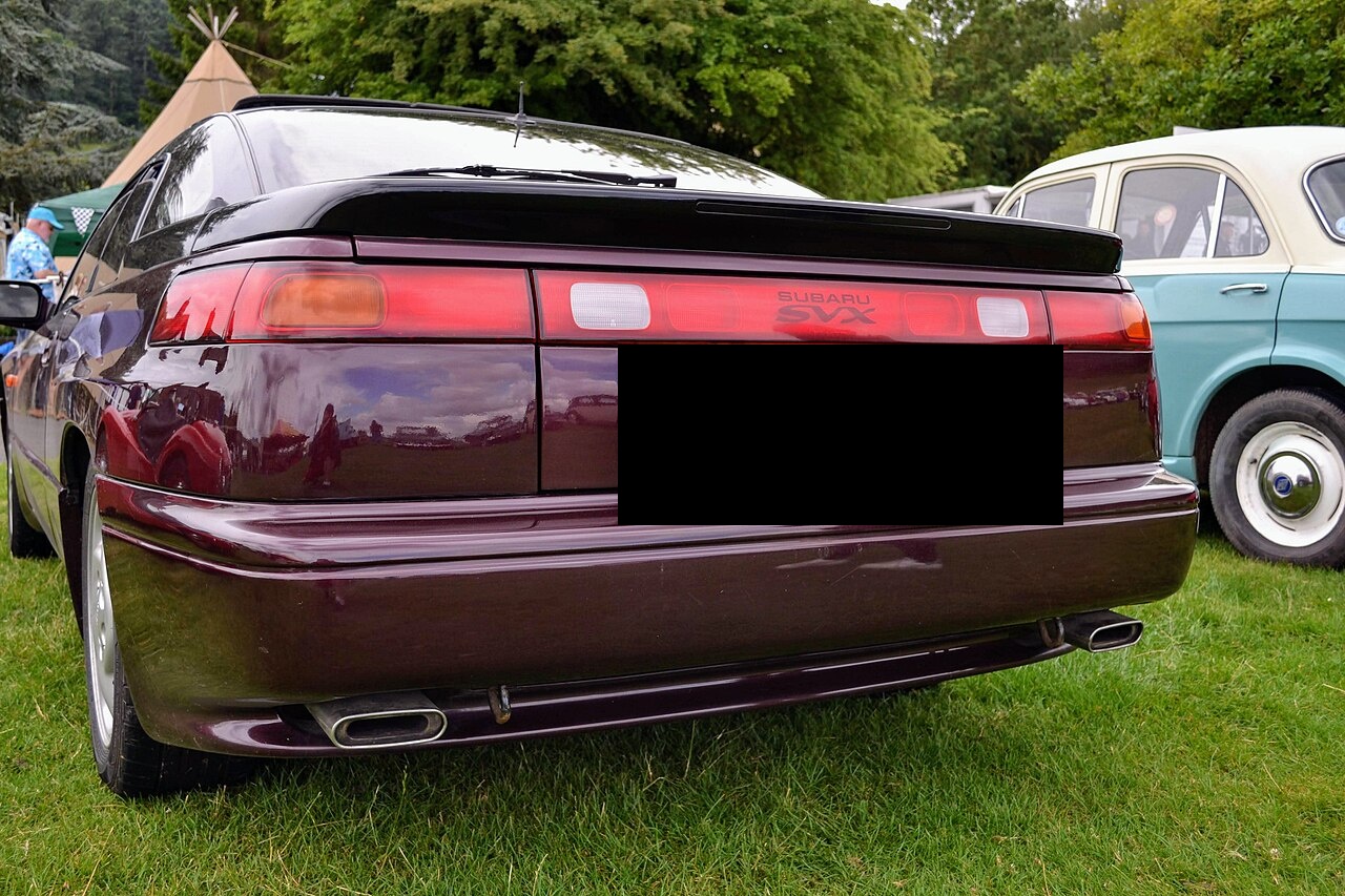 1992 Subaru SVX, maroon, rear view, "SUBARU SVX" badge, UK car show